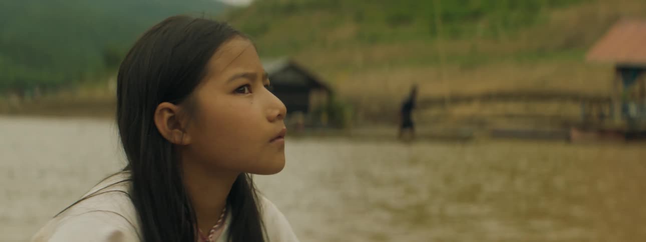 A child is traveling in the river