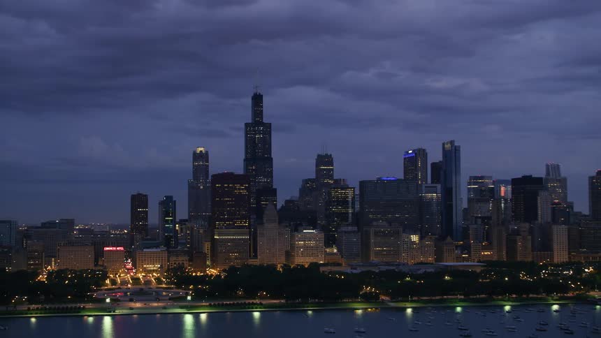 Aerial view of skyscrapers on the city skyline at night