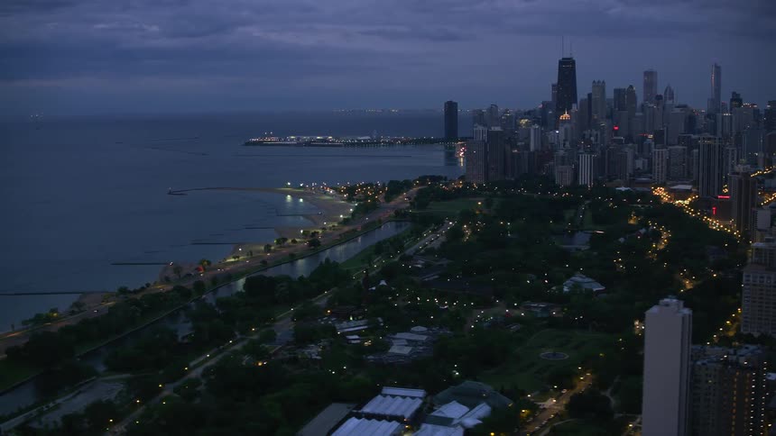The coastline of a metropolis on a cloudy evening