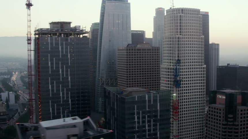 Tall buildings in a metropolis in the evening