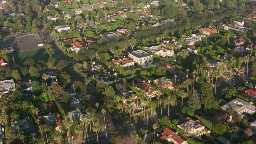 Rows of houses in a large neighborhood during the day