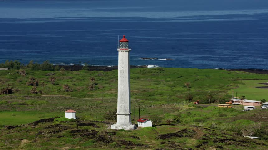 A light house on the shore by the ocean