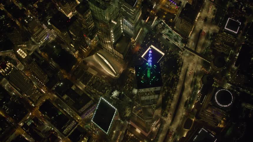 A well lit city is seen from above