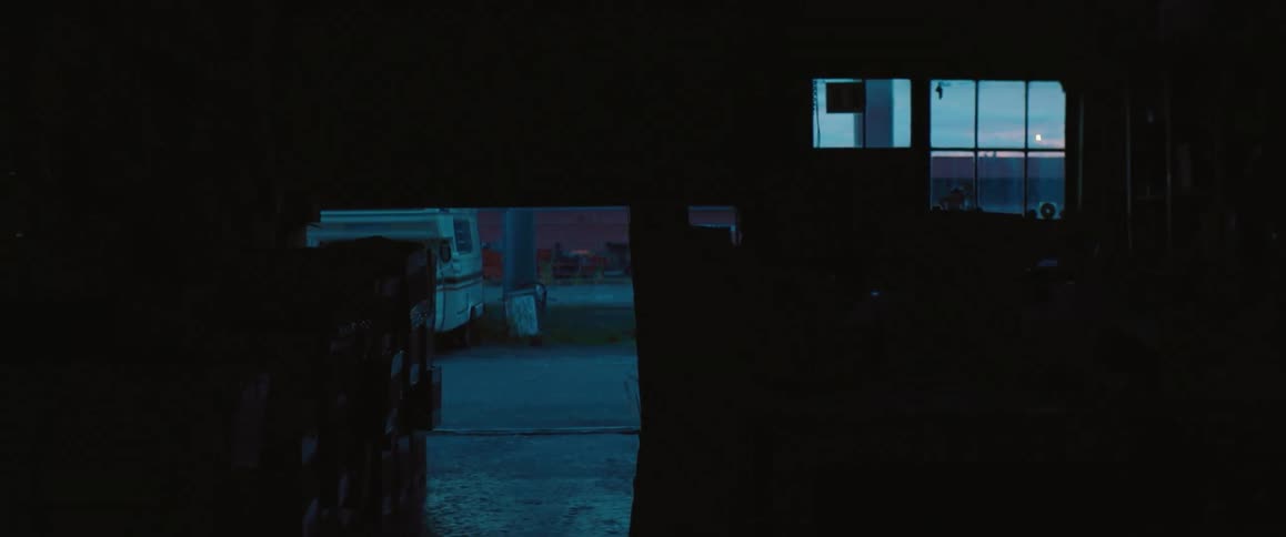 Garage door closes at dusk