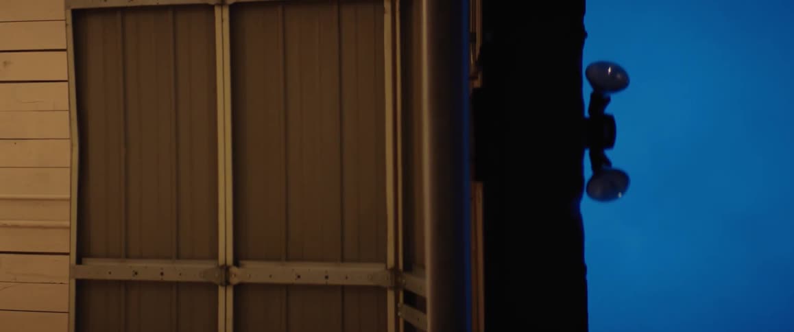 A door with a slip of paper taped to it slides open