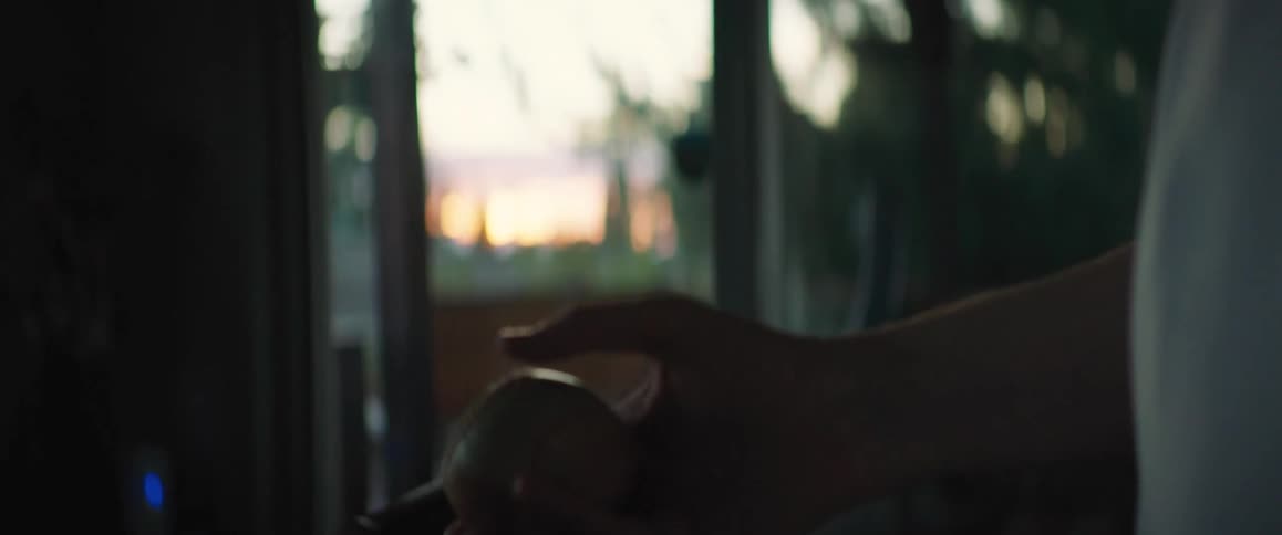 A person is holding a ball inside