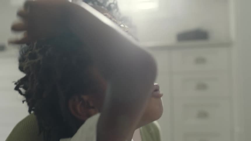 A mother and daughter looking at things in a house