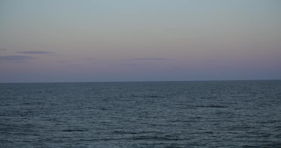 Water moves in waves across an ocean
