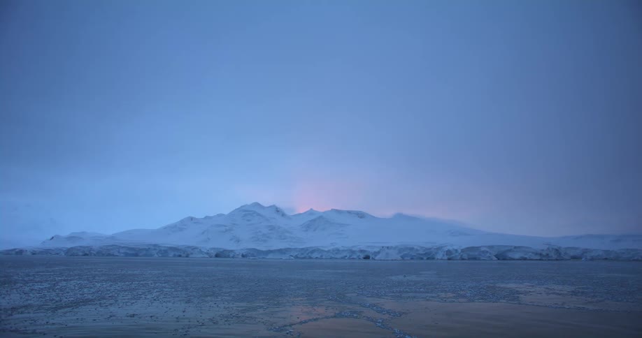 A view of a mountain with snow on it
