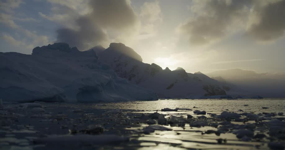 The sun is rising on the ice caps