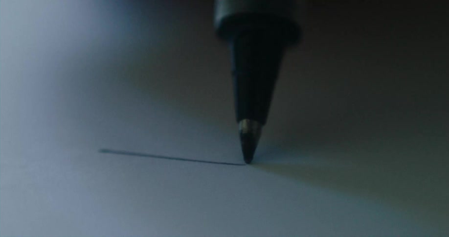 A felt tip pen used to draw a box on paper
