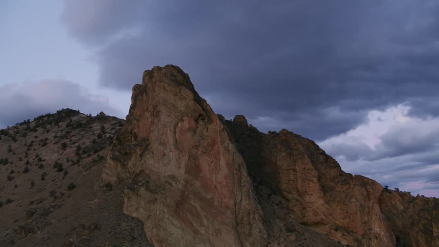 The corner of a canyon looms above the rest