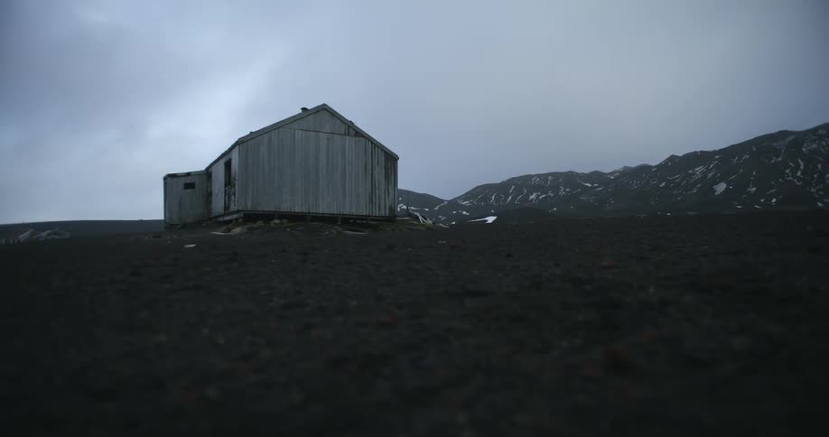 A barn is on the icy hill