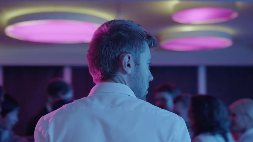 A group of people are at a party together indoors