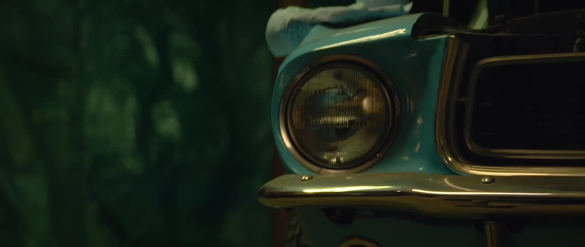 A towel sits on the vehicle hood