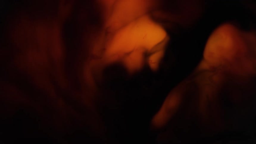 Reddish light area expands against the dark