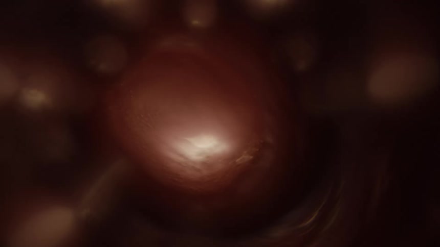 A distorted form in liquid pulses and expands creating bubbles that rise