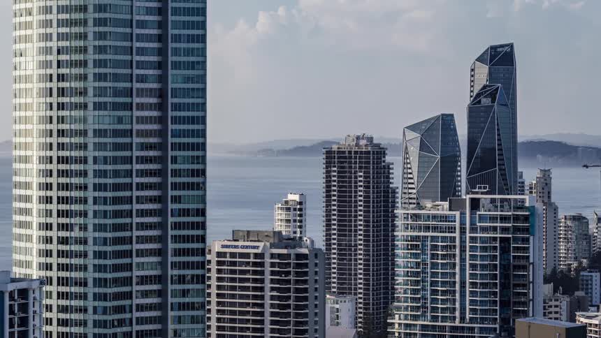 Aerial view of a downtown city is displayed midday