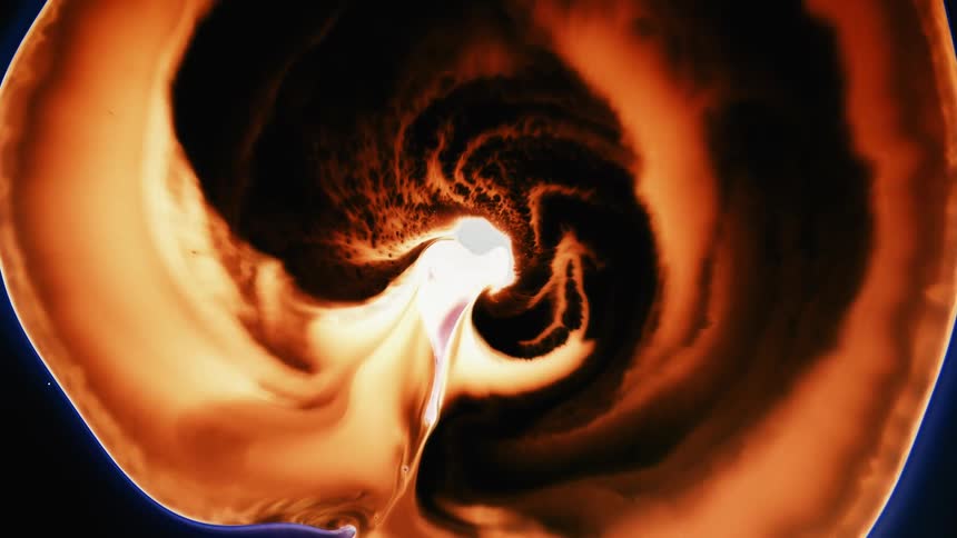 A liquid has spiraled outward forming a cavity