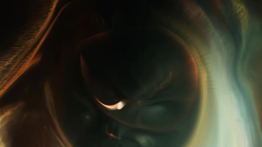 A ring of orange light grows into a bubble that spreads like an echo across an organic environment