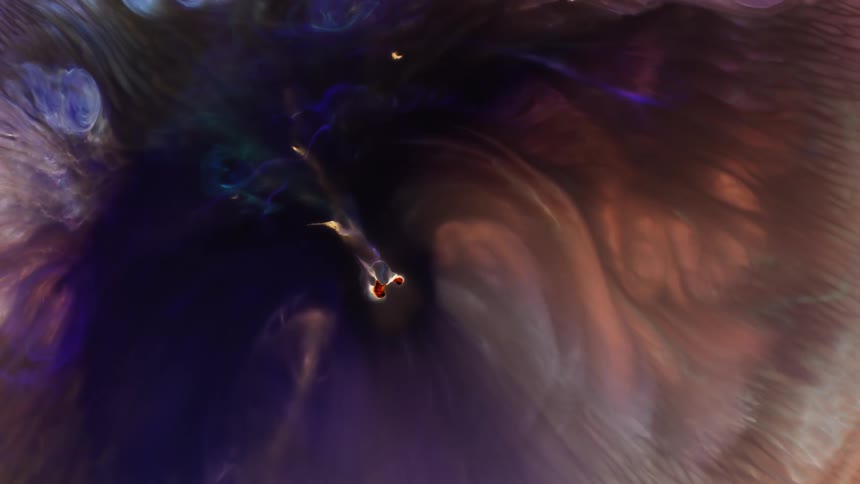 A strange object with a red core is moving in an organic environment that is changing and emitting orange and purple among the white colors in the darkness
