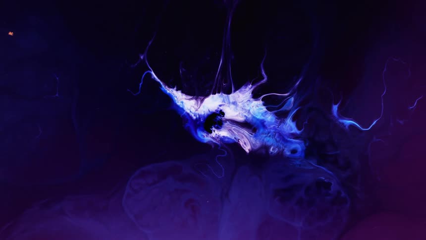 A substance is expanding in blue and purple colors