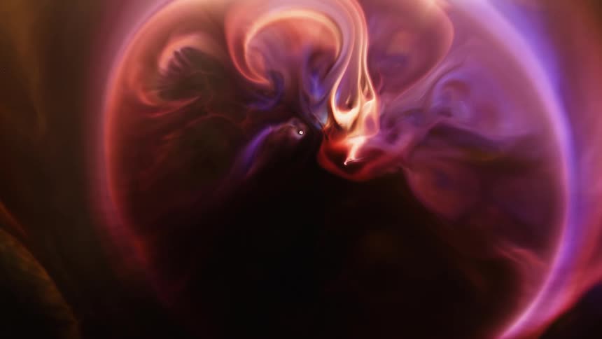 A ring of color explodes out from a center flaming swirl