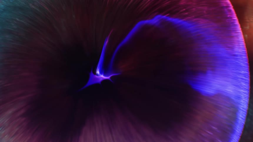 A glowing pink bubble expands in an organic environment