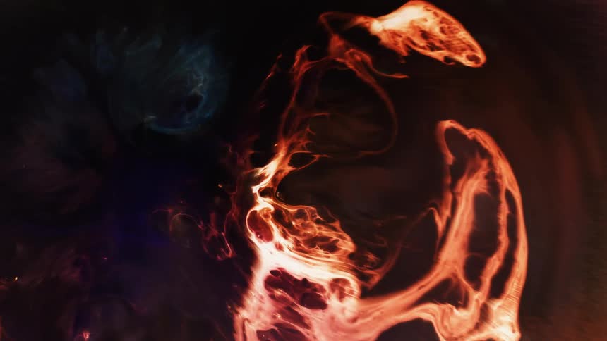 A flame moves through the night like a fireball