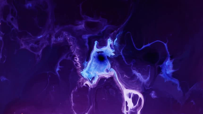 Visual effect of a moving cloud of dark blue and violet liquid ink flowing in streaks and slow waves