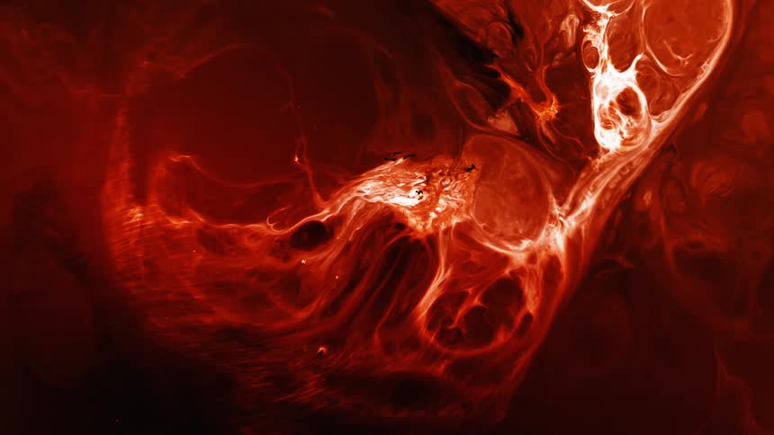 A thick viscous fluid expands and sends out tentacles