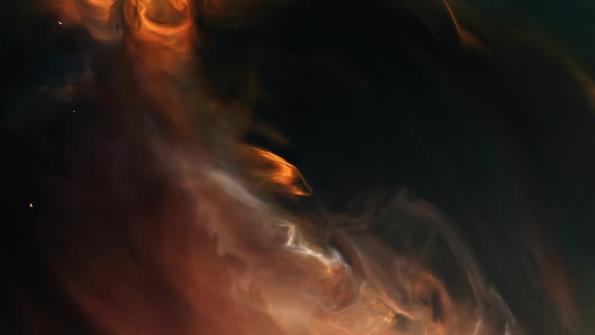 Smoke swirls around the red flames