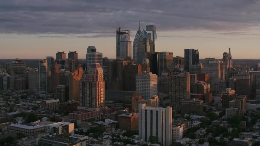 The sun is rising on the city