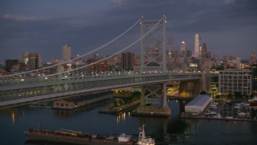 Aerial view of city life at night is displayed