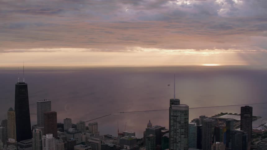 An aerial view of a city with tall buildings