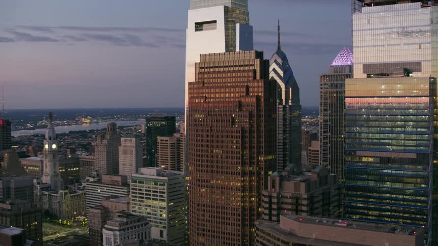 City buildings and skyscrapers at dusk