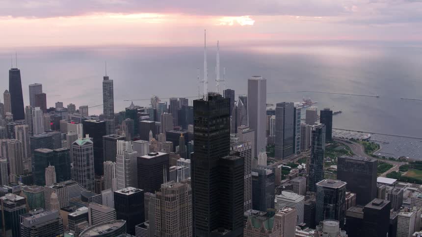 The sun is rising on the city