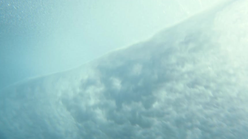 The waves crash in the ocean