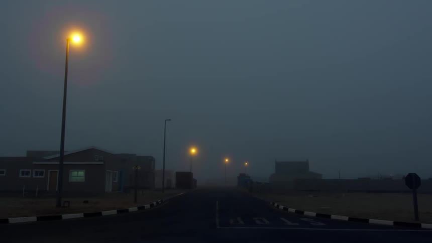 Thick fog covers a small town