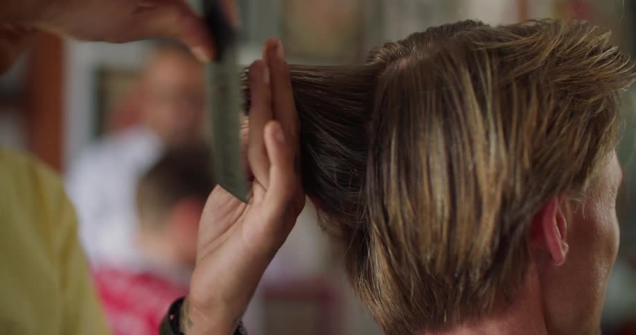Barbers are cutting customers hair