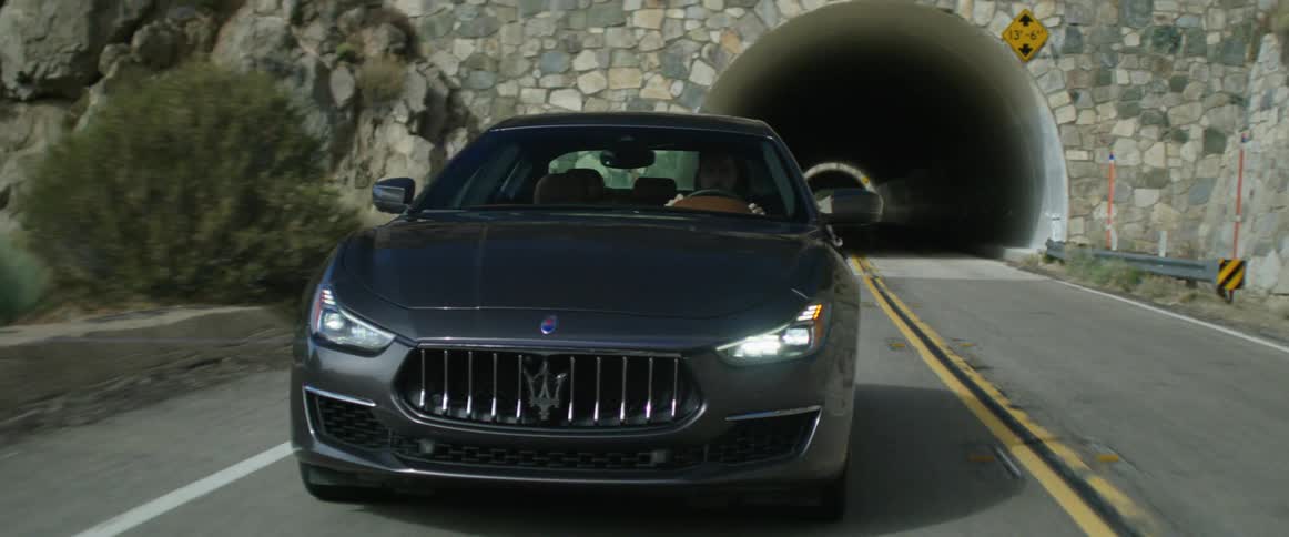 A car driving out of a tunnel