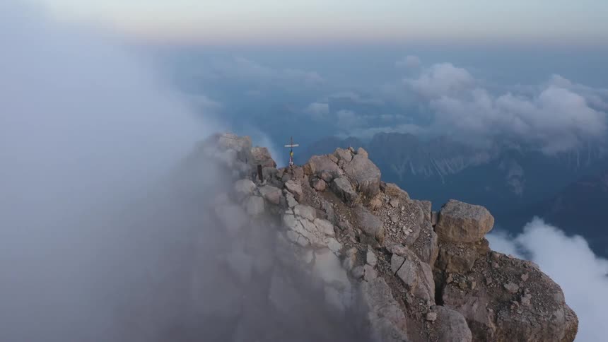 Aerial view of mountains with clouds are displayed