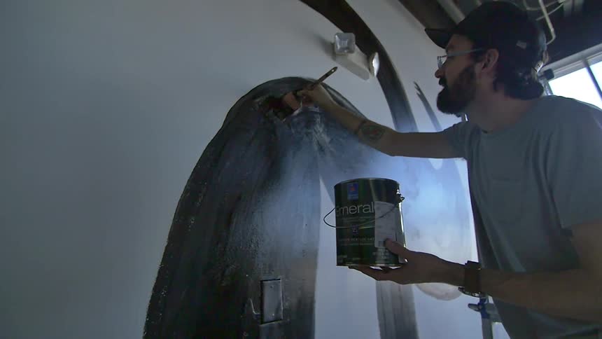 Artist Painting Mural