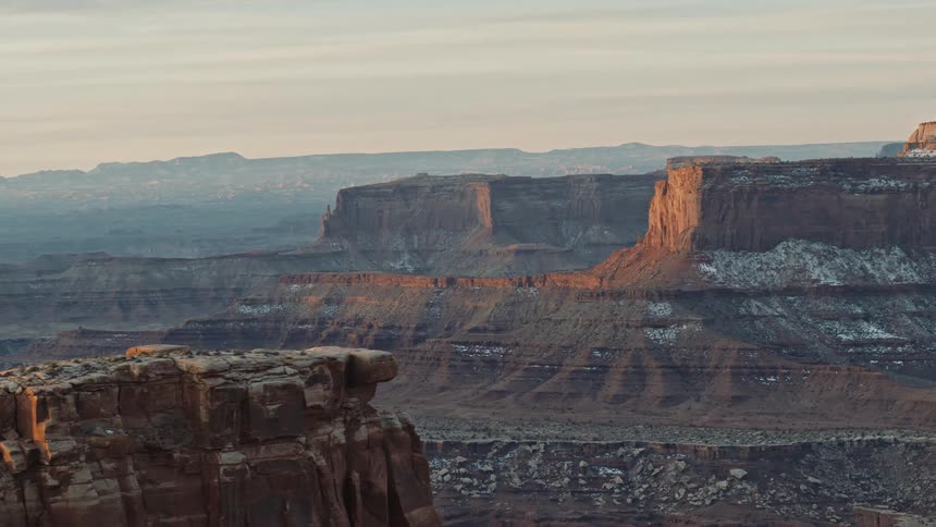 Aerial view of the tall plateaus over the mesas on the badlands at evening