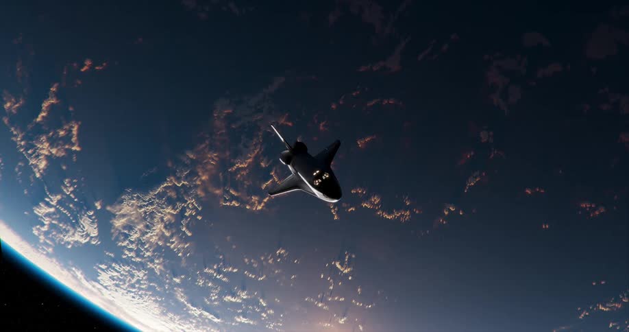 A space shuttle floats in outer space with the planet earth visible behind it