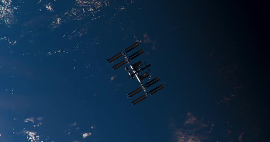 The space station satellite is floating in space