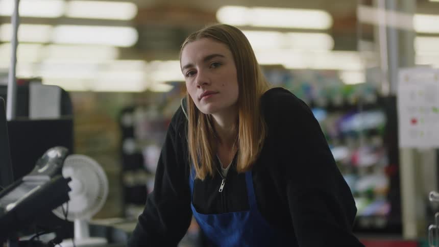 A woman working in a grocery store