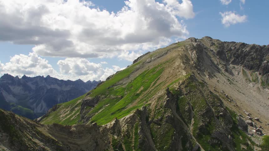 Aerial view of green mountain slope