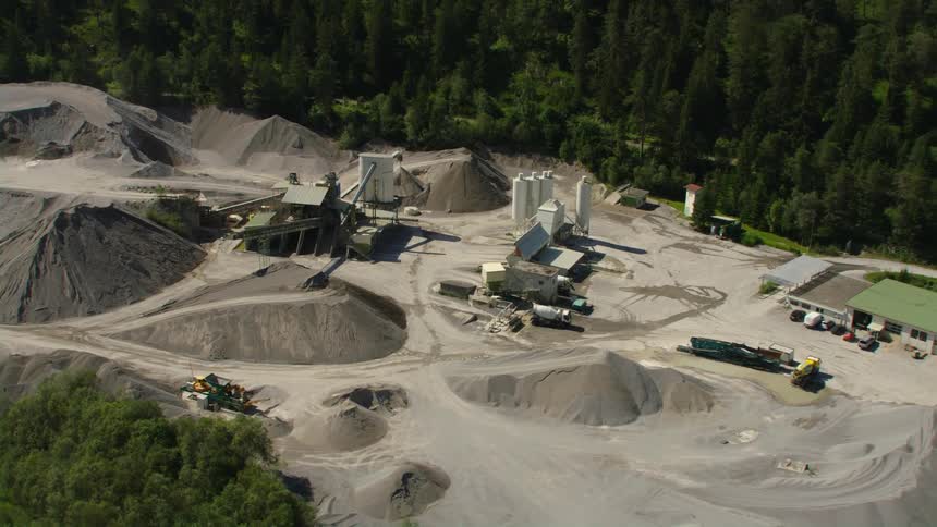 Aerial view of construction area in the forest next to river