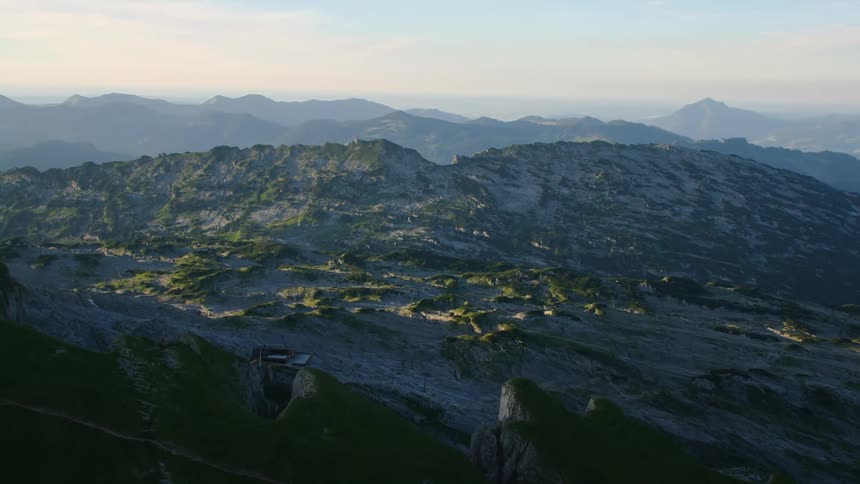 Aerial view of the rugged terrain on the slopes of a mountain at morning